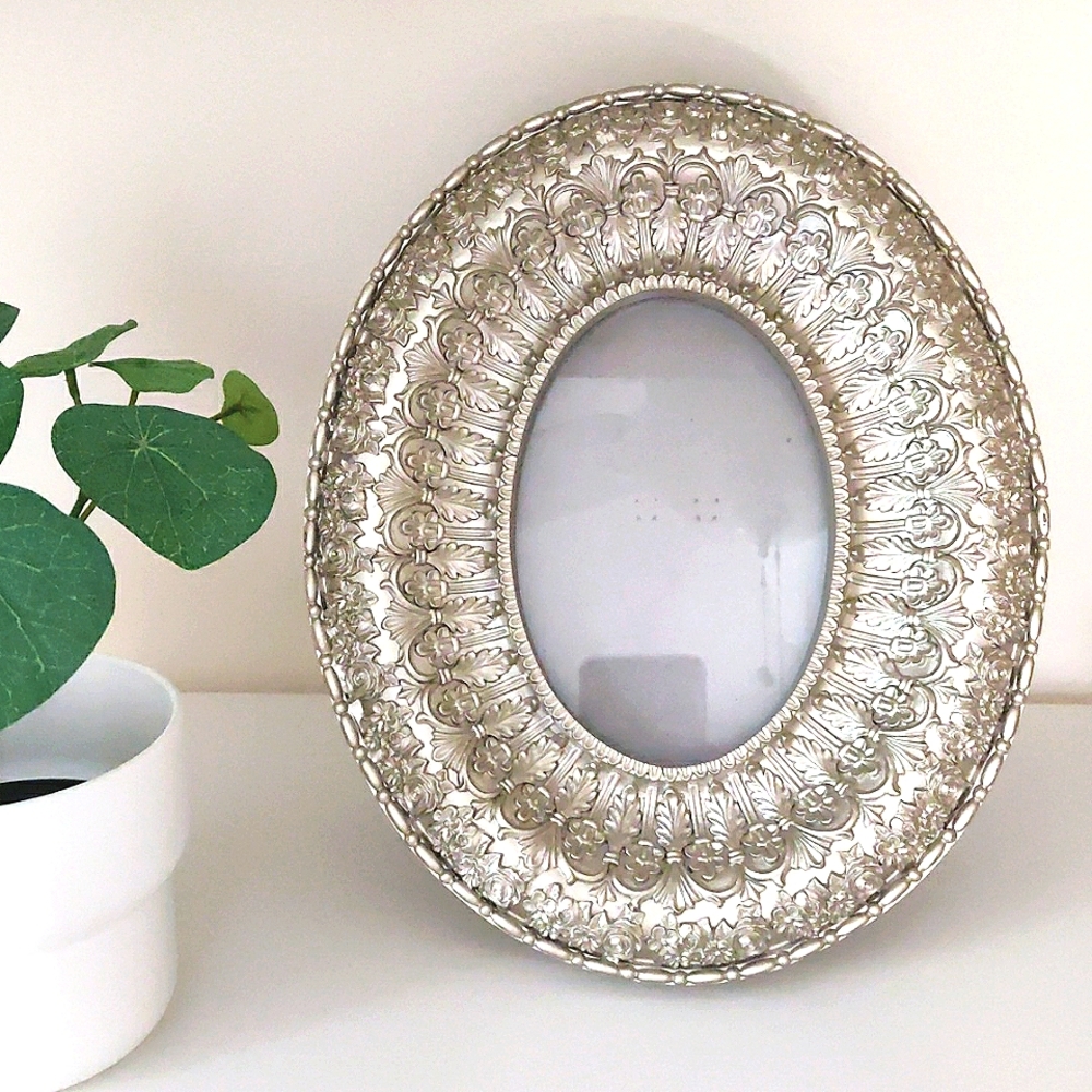 Broyhill silver frame oval.